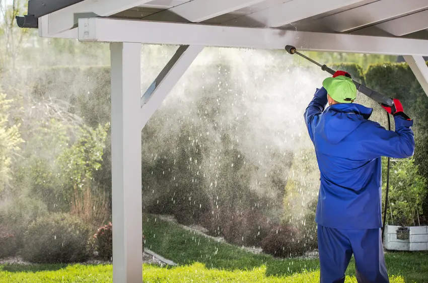 A cleaner pressure washing of a house roof in orange, ca