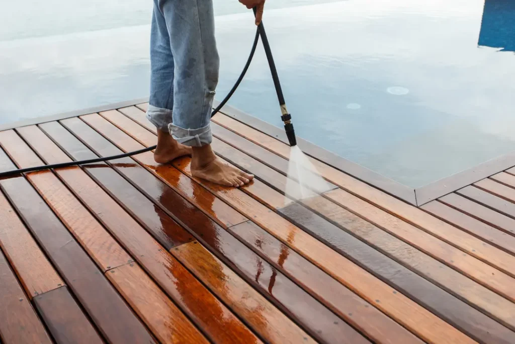 A man washing deck