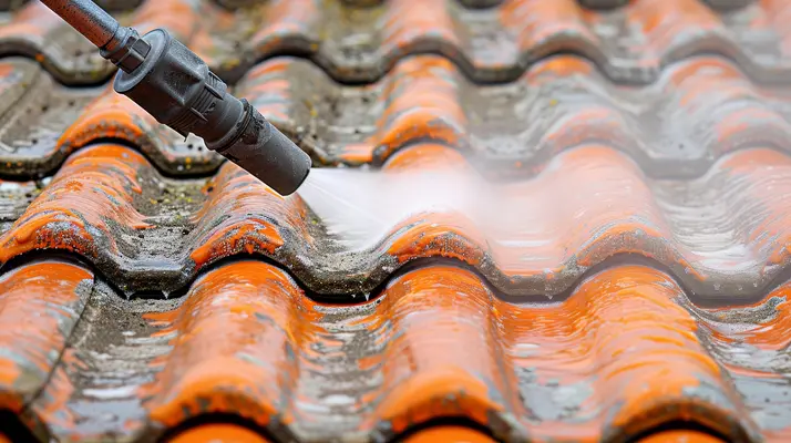Cleaning 2 years old roof tiles throughly with high pressure washing