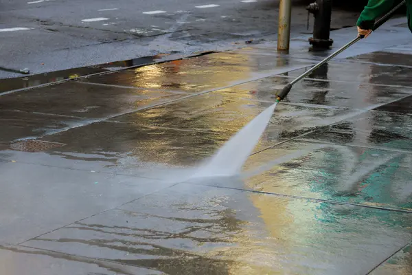 Cleaning dirty, slippery, grease walkways using pressure washing