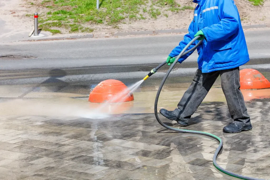 Pressure washing commercial sidewalk
