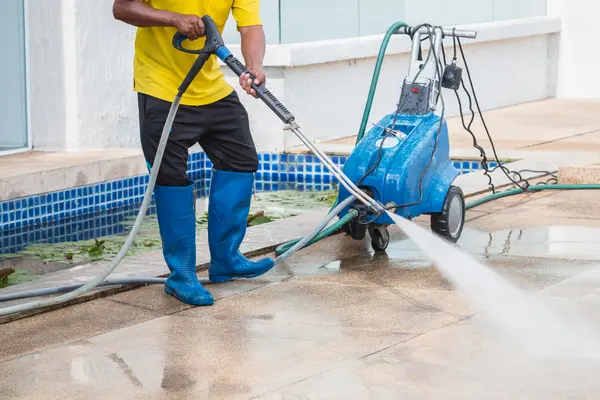 Washing patio with pressure washing